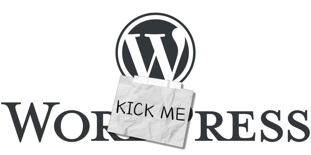 WordPress Logo with a "Kick Me!" sign taped to it